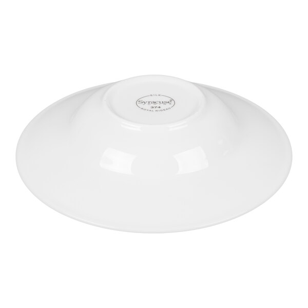 A white porcelain bowl shown upside down with a wide rim and a small circular base.