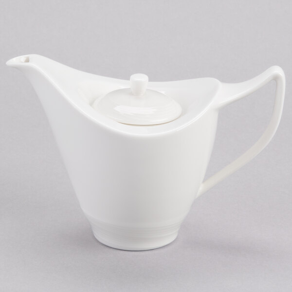 A white Royal Rideau porcelain teapot with a lid.