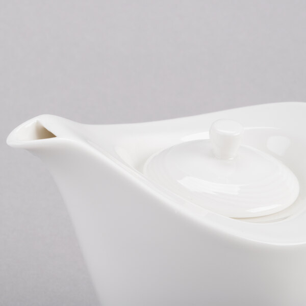 A white Royal Rideau Tea Pot with a lid.