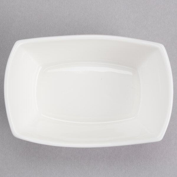 A white rectangular bowl on a white background.