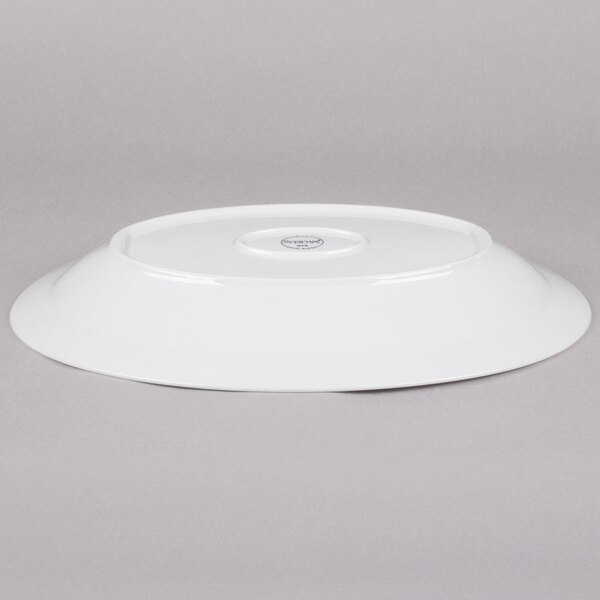 A white Reserve by Libbey oval porcelain platter with a narrow rim.