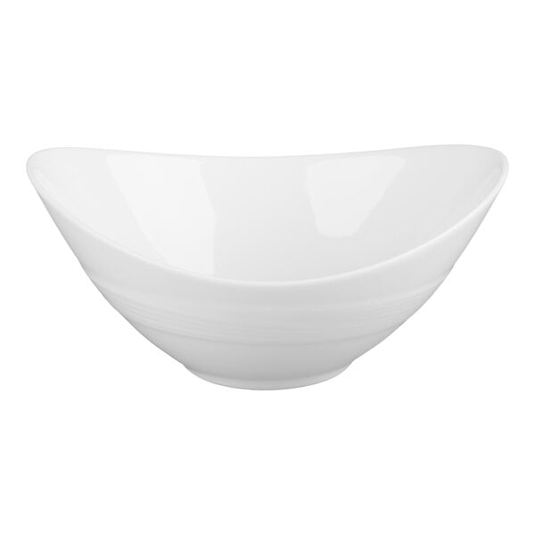 A white, oval-shaped porcelain bowl with smooth, curved edges.
