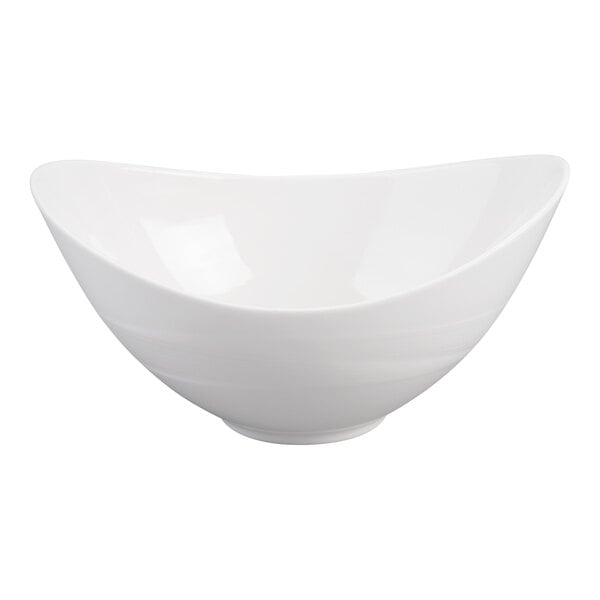 A white, oval-shaped porcelain bowl with a smooth, glossy finish.