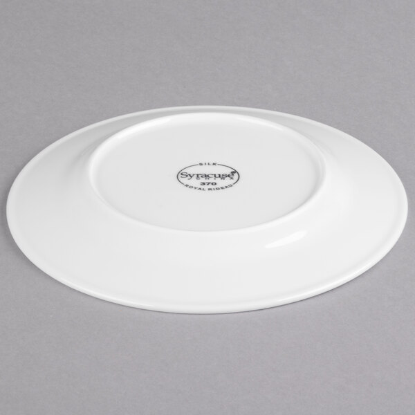 A white Reserve by Libbey porcelain plate with a small logo in black.