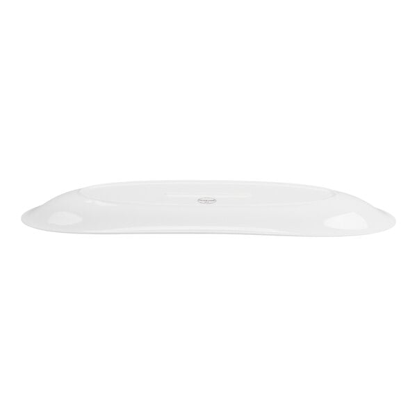 A white, elongated oval porcelain tray with a smooth, glossy finish, viewed from the side.