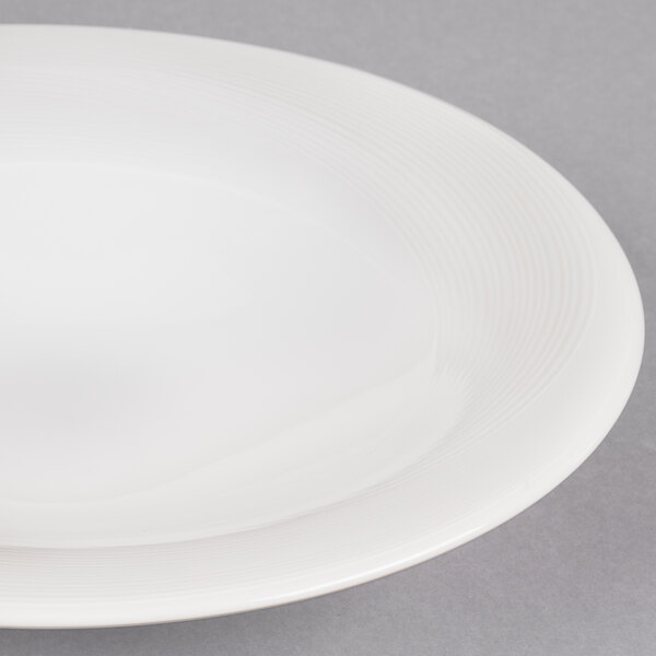 A white porcelain bowl with a thin rim.