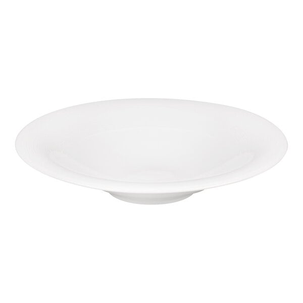 A white, round, shallow porcelain bowl with a wide rim and a small base.