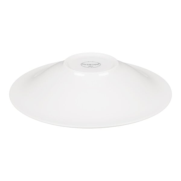 A white, round porcelain bowl shown upside down on a plain background.