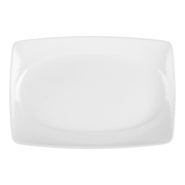 A rectangular white porcelain platter with slightly curved edges and a smooth surface.