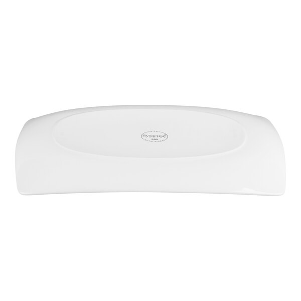 A white, rectangular porcelain platter shown from the bottom with a small logo or stamp in the center.