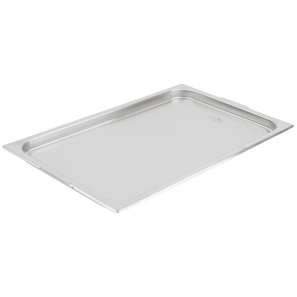 A Vollrath stainless steel tray with a lid.