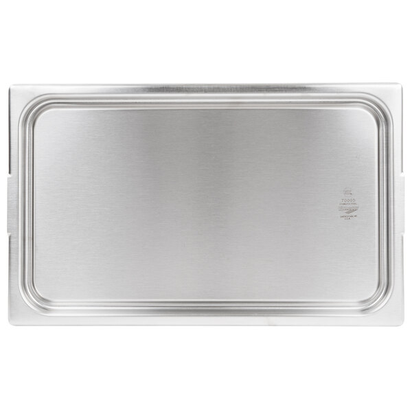 A Vollrath stainless steel food transport cover on a stainless steel tray.