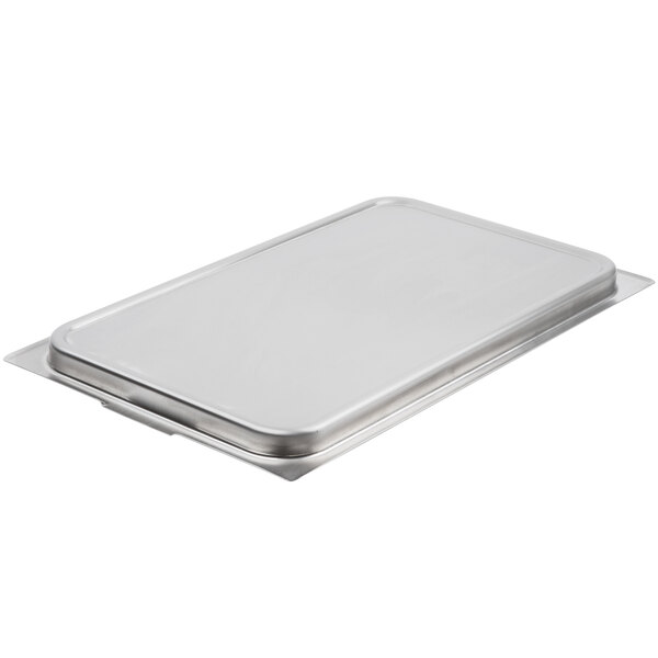 A Vollrath stainless steel tray with a lid.