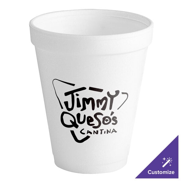 A white Dart foam cup with black text that says "Jimmy Quesos" on a counter.