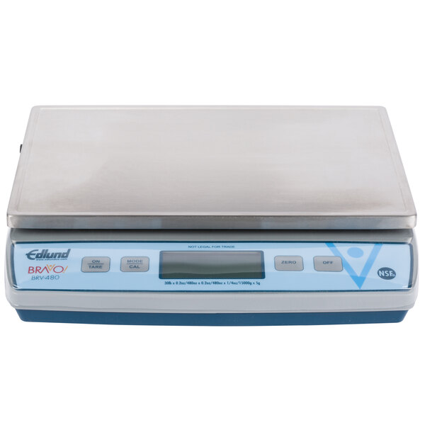 An Edlund BRAVO! digital portion scale with a white base and blue top.