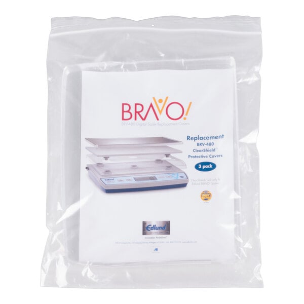 A package of 3 Edlund ClearShield protective scale covers with a picture of a scale on the bag.