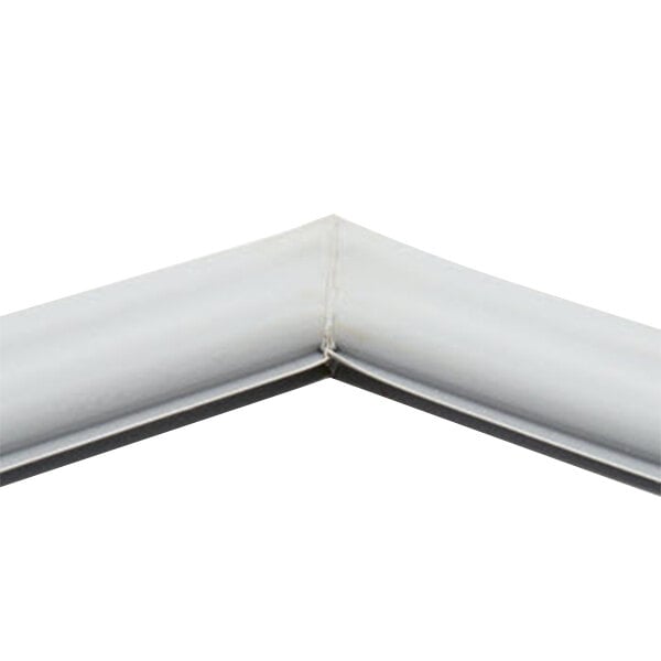 A close-up of a white corner with a black border.