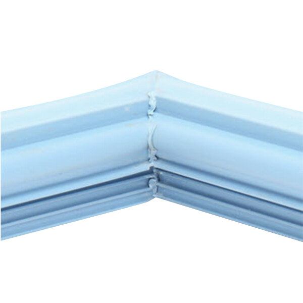 A close-up of a blue corner piece with two pipes on a white background.