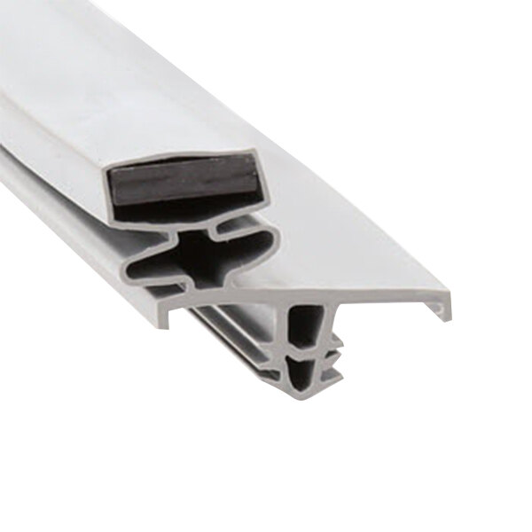 A close-up of a black plastic magnetic strip with a metal cross-section.