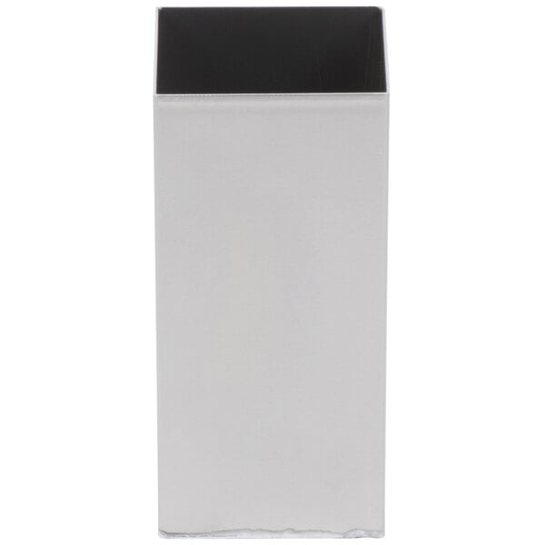 A white rectangular object with a black top and black border.