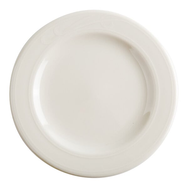 A round, plain ivory-colored plate with a subtle embossed pattern near the rim.