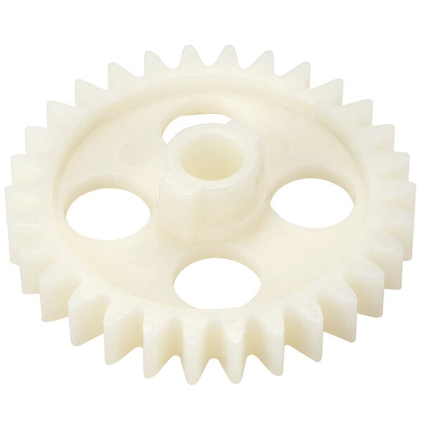A white plastic gear with holes.