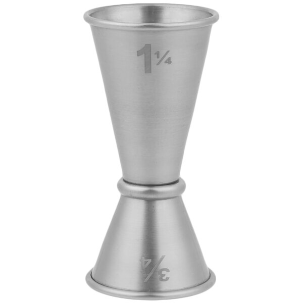 An American Metalcraft stainless steel Japanese style jigger with numbers on a white surface.