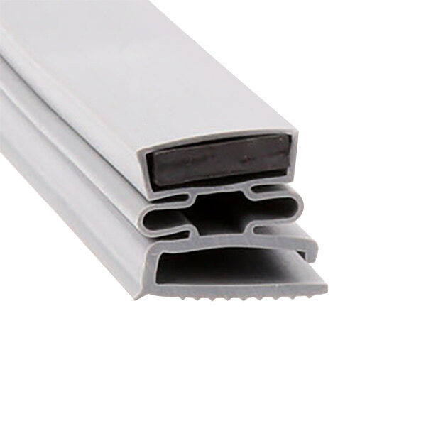 A close up of a black and white rubber strip with a magnet inside.