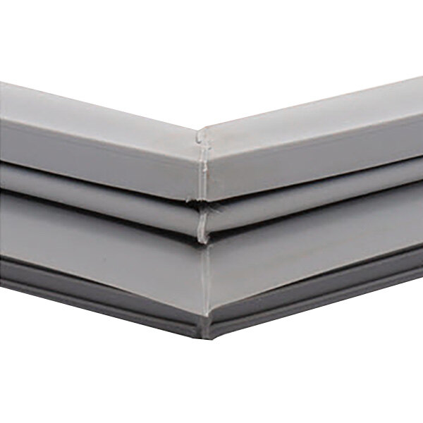 A close up of a gray Traulsen magnetic door gasket corner.