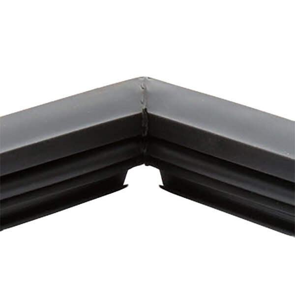 A black corner piece for a Traulsen magnetic door gasket.