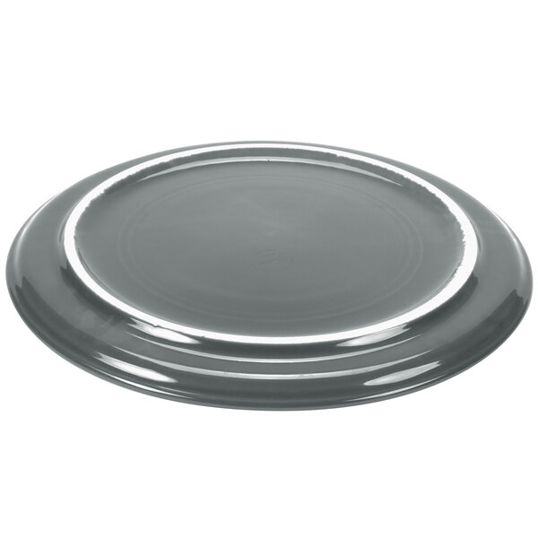 A grey Fiesta® Dinnerware china pizza tray with a white border.