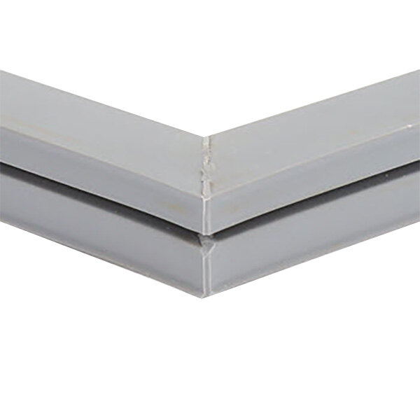 A gray metal corner of a Traulsen magnetic door gasket.