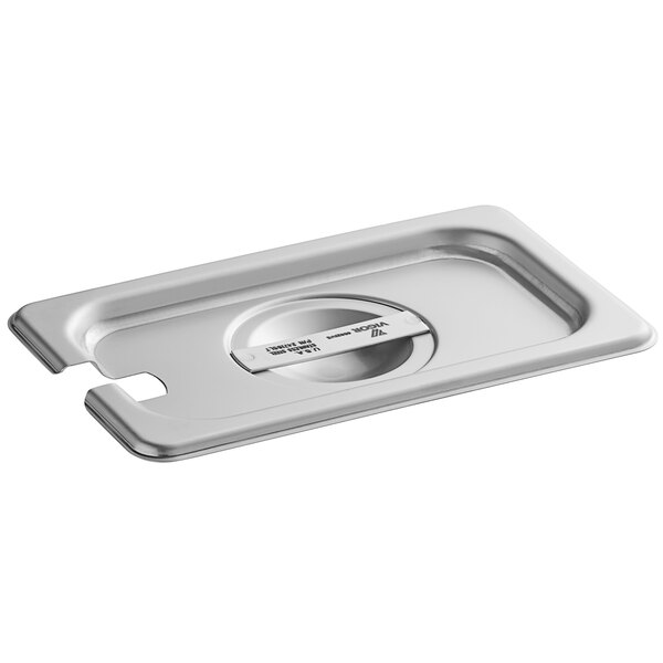 A Vigor stainless steel pan cover on a stainless steel pan.