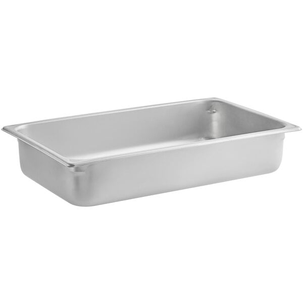 A Vigor stainless steel hotel pan on a white counter.