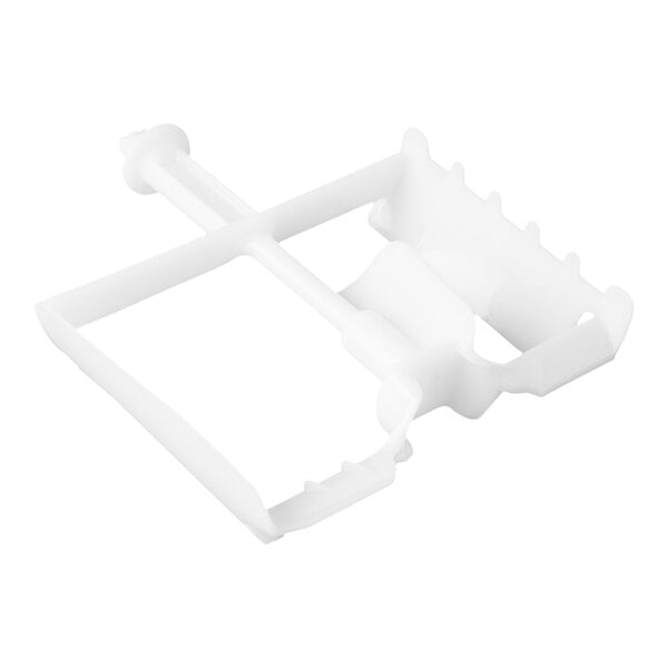 A white plastic ice cream paddle attachment for a Waring ice cream maker.
