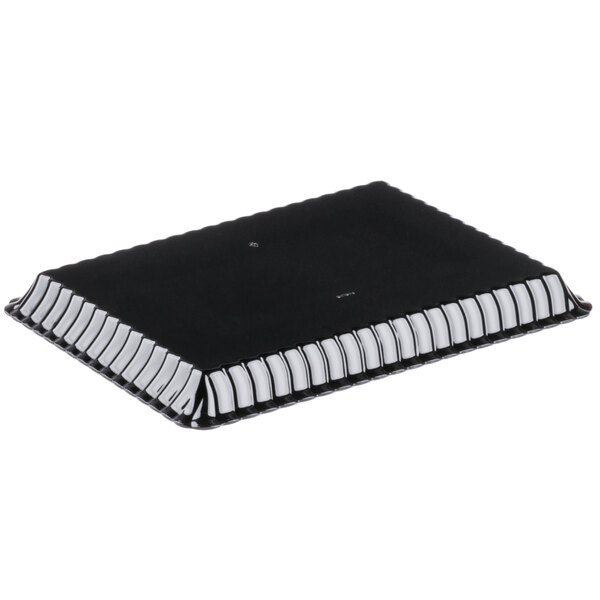 A black plastic rectangular tray in a white box.