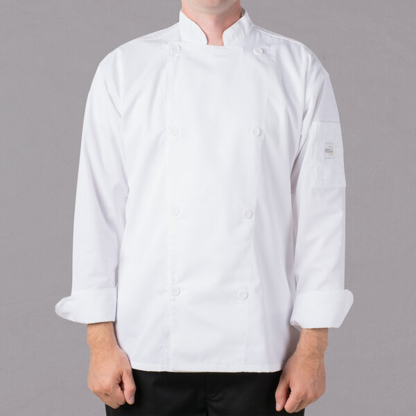 A man wearing a white Mercer Culinary chef jacket.