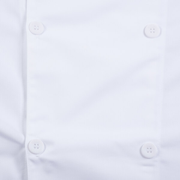 A close up of a white Mercer Culinary chef's jacket with a white button with four holes.