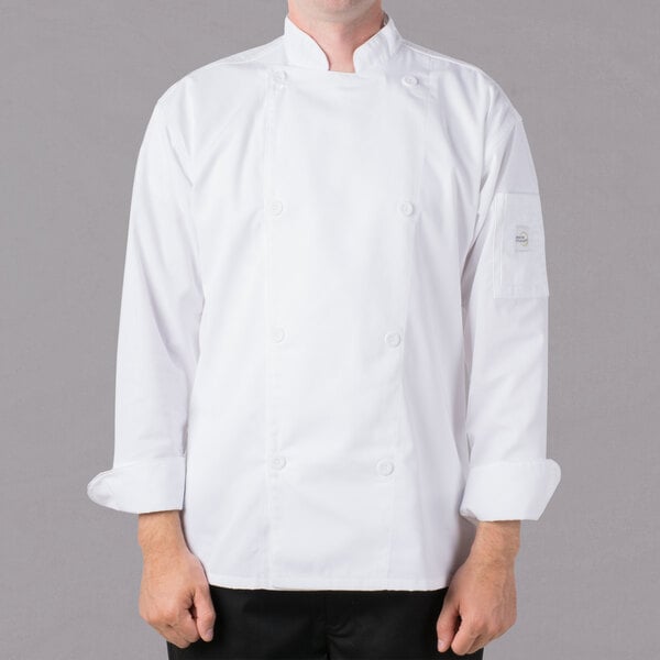 A man wearing a white Mercer Culinary chef jacket.
