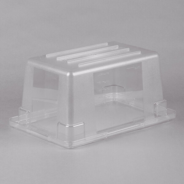 A clear plastic VacMaster sous vide water tank with a clear lid.