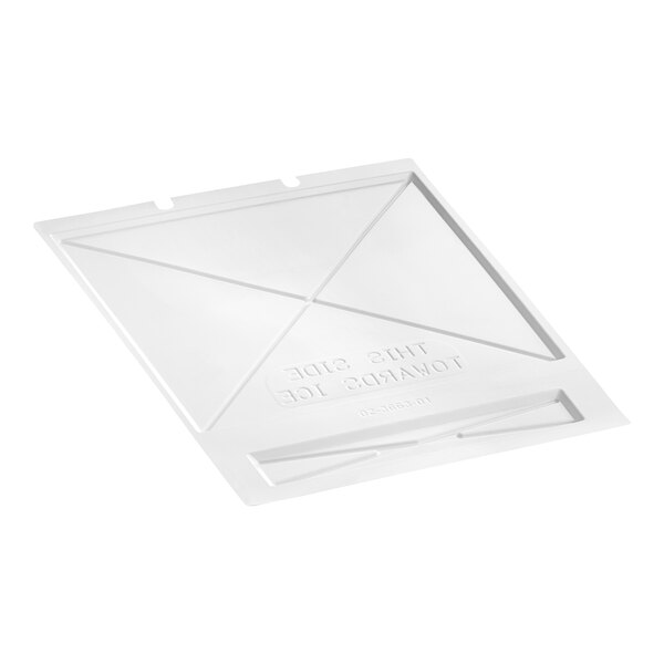 A white plastic Scotsman evap cover with a small hole in it.