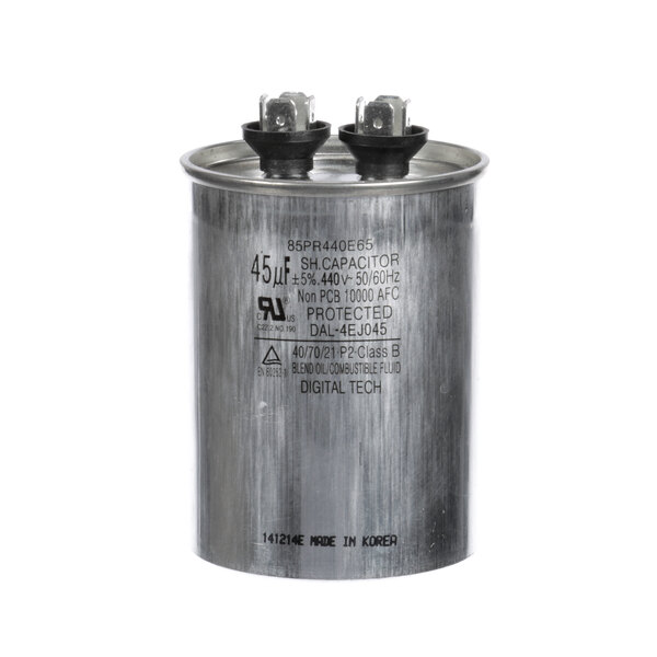 A round silver Master-Bilt run capacitor with black caps on top.