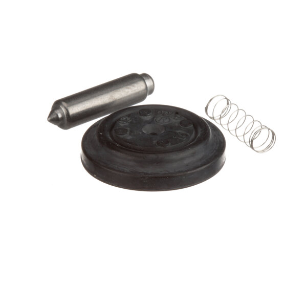A black rubber disc with a circular design and a metal rod with a spring.