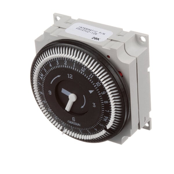 A Norlake defrost time clock with a white dial.