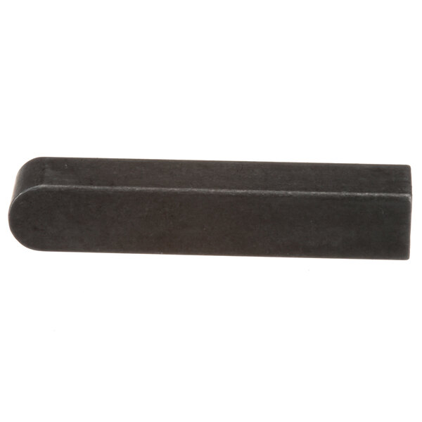 A black rectangular Univex key.