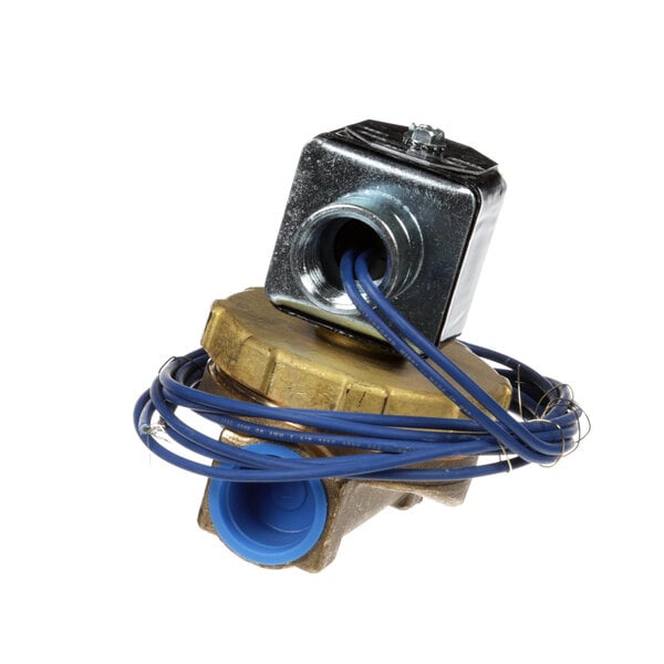 A Champion brass valve with blue wires attached.