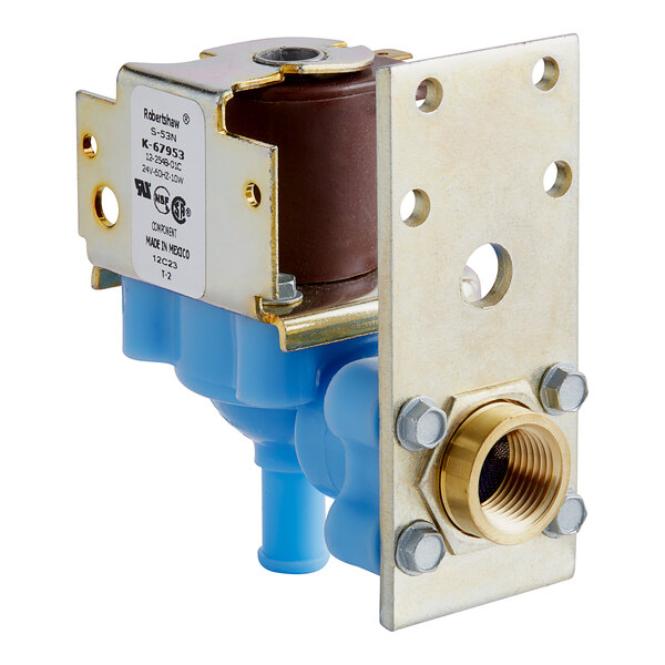 A close-up of a Scotsman water inlet valve with a blue and gold metal device and brass nut.