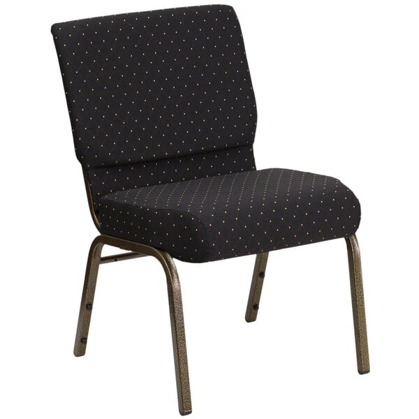 A black church chair with gold dots on the backrest.