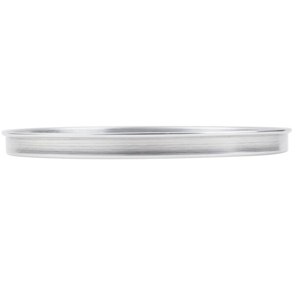 An American Metalcraft silver standard weight aluminum pizza pan.