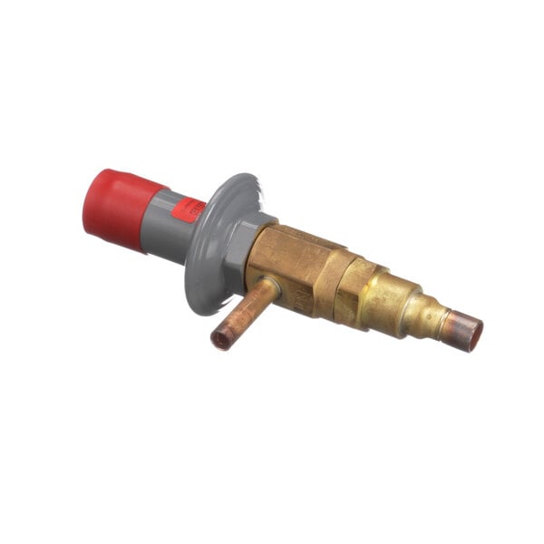 A close-up of a brass and red Manitowoc Ice HPR valve.
